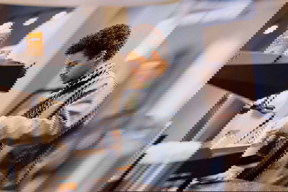 Man making a hot coffee