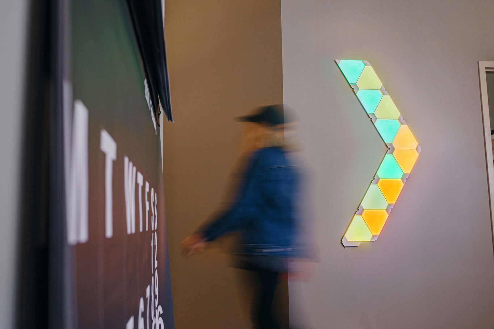 Woman smiling looking at a computer screen